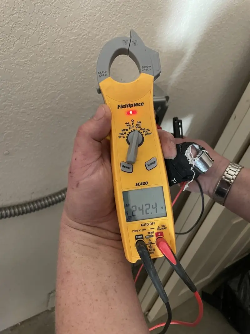 Voltage testing with clamp meter during Generator Installation in Thiensville